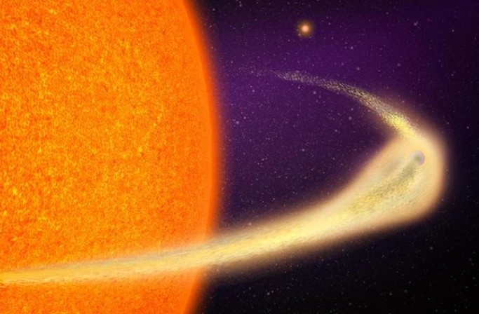 Ảnh đồ họa mô tả hành tinh tan chảy BD+05 4868 Ab như đang bị vùi lấp trong chính chiếc đuôi đá rực lửa của nó - Ảnh: MIT